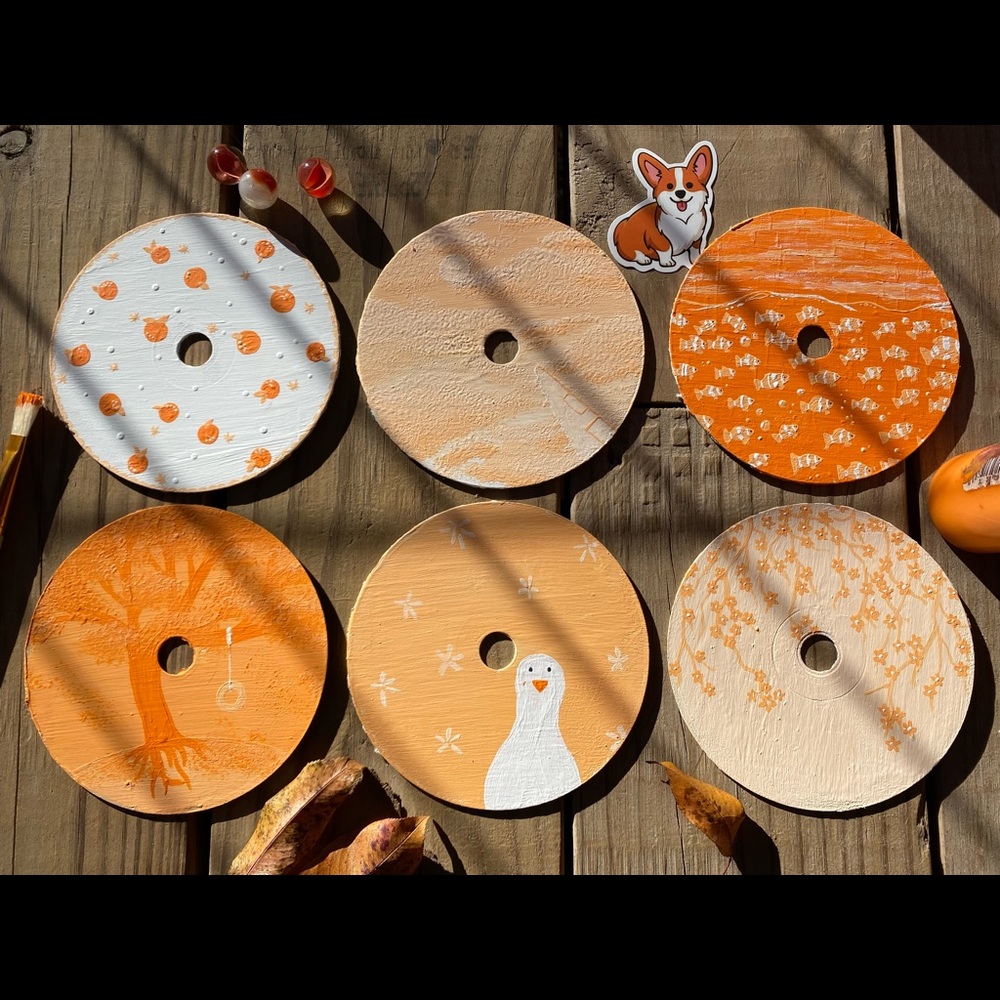 Set of 6 painted cd’s themed orange :)